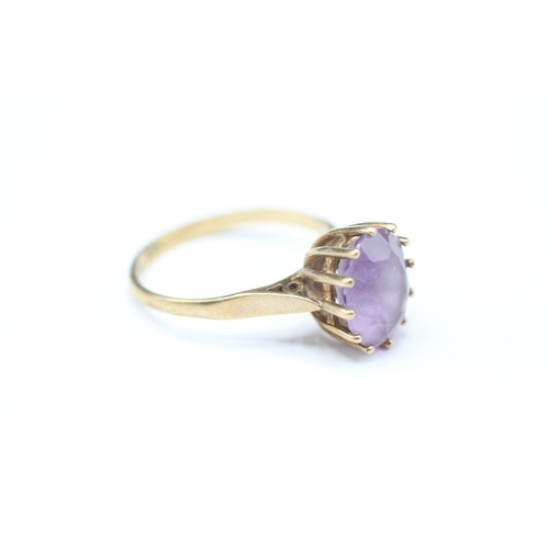 209 - 9ct gold amethyst single stone ring (2.4g) Size M