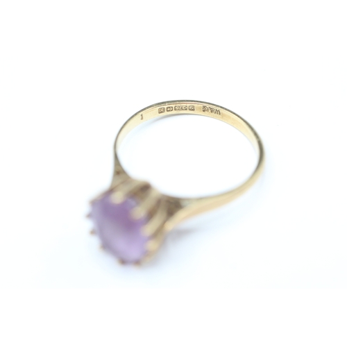 209 - 9ct gold amethyst single stone ring (2.4g) Size M