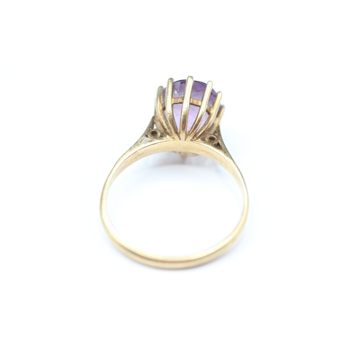 209 - 9ct gold amethyst single stone ring (2.4g) Size M