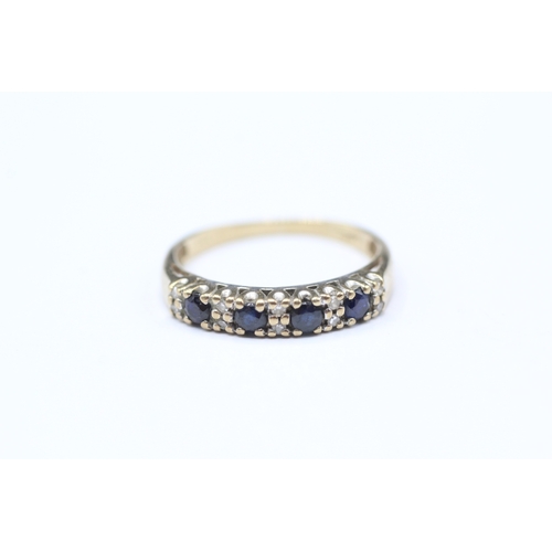 218 - 9ct gold four round cut blue gemstone with diamonds ring (1.5g) Size L