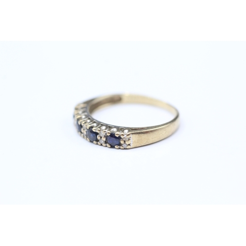 218 - 9ct gold four round cut blue gemstone with diamonds ring (1.5g) Size L