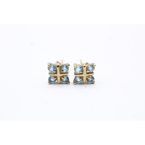 221 - 9ct gold blue gemstone stud earrings (1.3g)