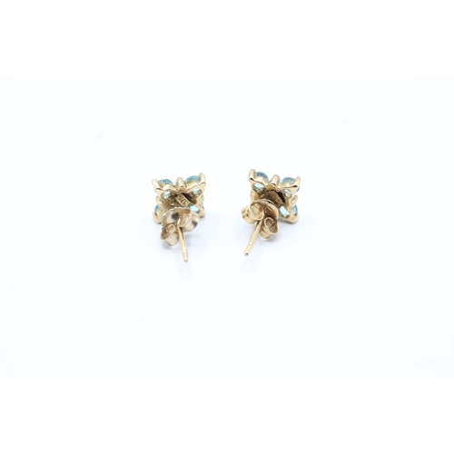 221 - 9ct gold blue gemstone stud earrings (1.3g)