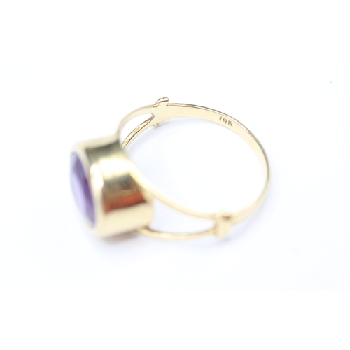 231 - 18ct gold amethyst single stone ring (4.2g) Size P