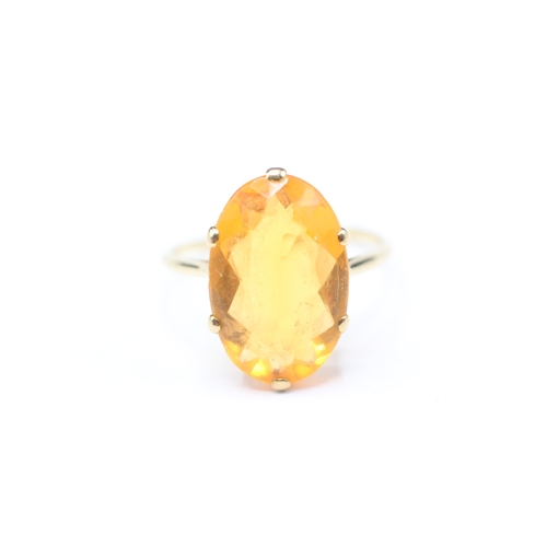 236 - 9ct gold orange gemstone cocktail ring (2.9g) Size O