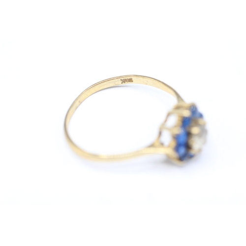 241 - 9ct gold blue and white gemstone ring (1.7g)