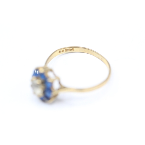 241 - 9ct gold blue and white gemstone ring (1.7g)