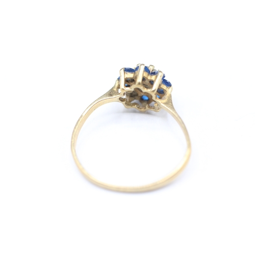 241 - 9ct gold blue and white gemstone ring (1.7g)