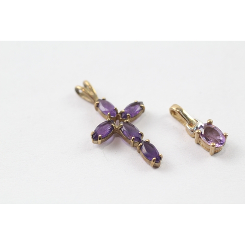 245 - 2 x 9ct gold amethyst pendants (1.7g)