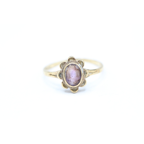 248 - 9ct gold and purple gemstone ring (1.6g) Size Q