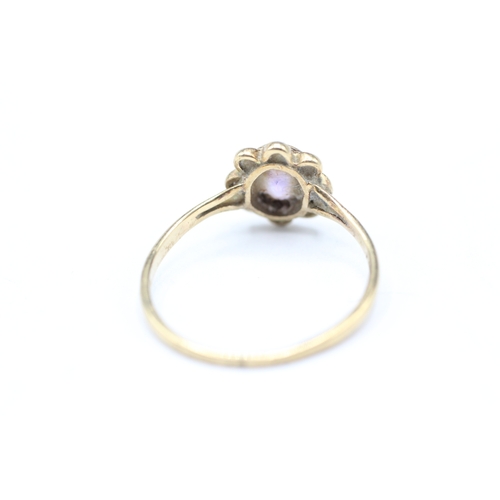 248 - 9ct gold and purple gemstone ring (1.6g) Size Q