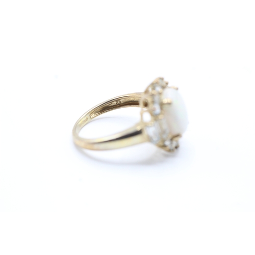 32 - 9ct gold opal and white gemstone ring (3g) Size J 1/2