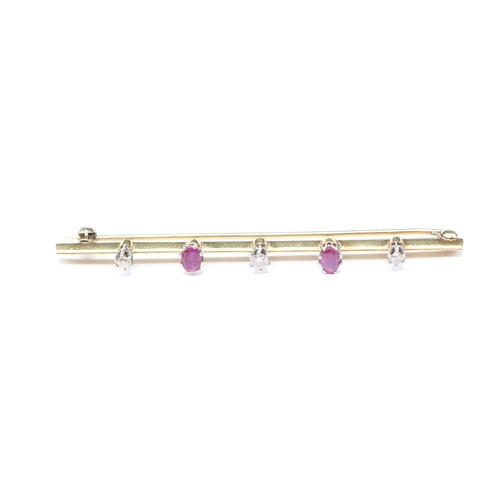 36 - 18ct gold and platinum with ruby and diamond brooch (4.4g)