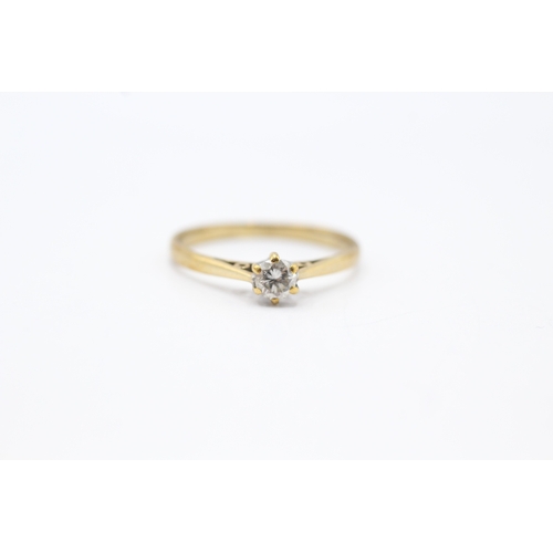 39 - 9ct gold solitaire diamond ring (1.2g) Size L 1/2