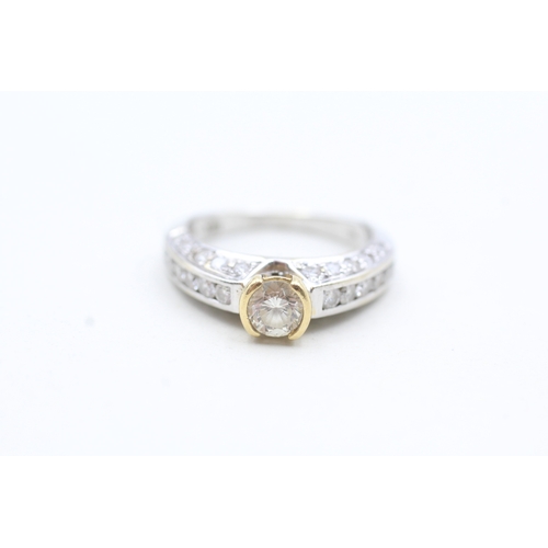 44 - 18ct white and yellow gold diamond set ring (5.6g) Size K