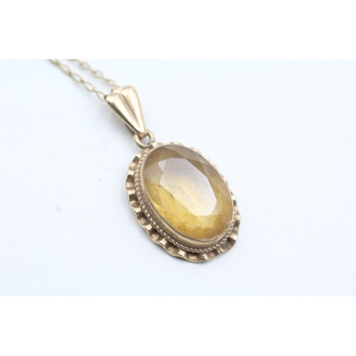 51 - 9ct gold citrine pendant on chain (2.9g)