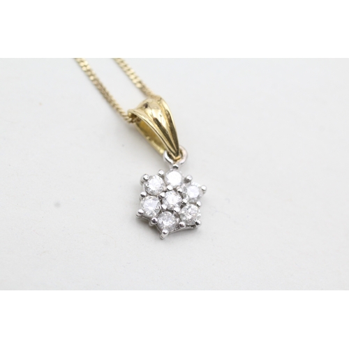 63 - 18ct gold diamond flower cluster pendant on chain (3.7g)