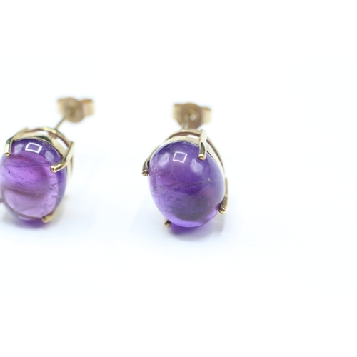 68 - 9ct gold and amethyst stud earrings (3.5g)