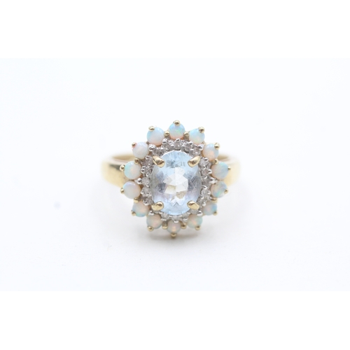 7 - 9ct gold opal, diamond and blue gemstone halo ring (3.7g) Size P