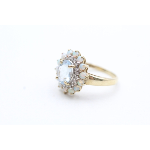 7 - 9ct gold opal, diamond and blue gemstone halo ring (3.7g) Size P