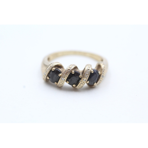 75 - 9ct gold blue gemstone and diamond ring (3.8g) Size Q