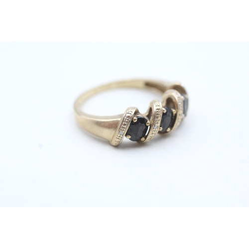 75 - 9ct gold blue gemstone and diamond ring (3.8g) Size Q