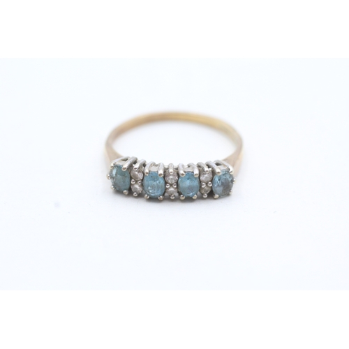 76 - 9ct gold diamond and blue gemstone row set ring (2.4g) Size P