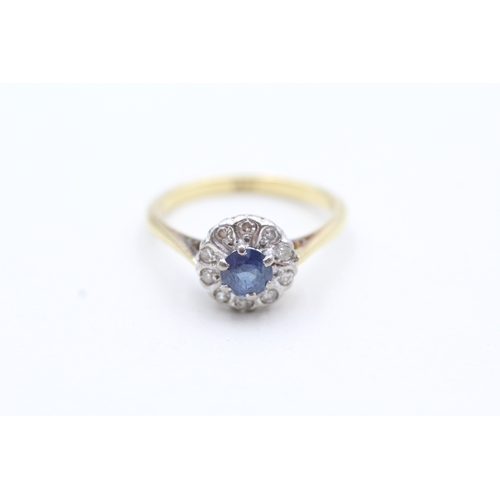 79 - 18ct gold diamond and sapphire halo cluster ring (3.2g) Size N