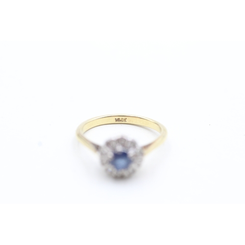 79 - 18ct gold diamond and sapphire halo cluster ring (3.2g) Size N