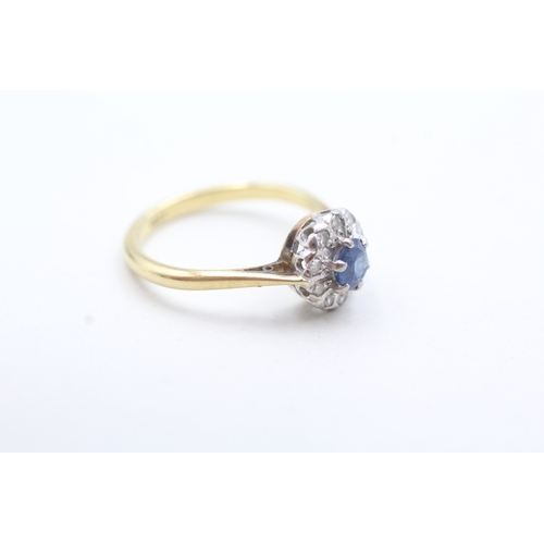 79 - 18ct gold diamond and sapphire halo cluster ring (3.2g) Size N