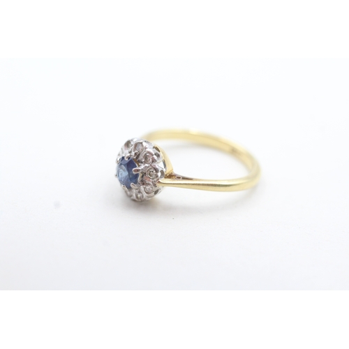 79 - 18ct gold diamond and sapphire halo cluster ring (3.2g) Size N