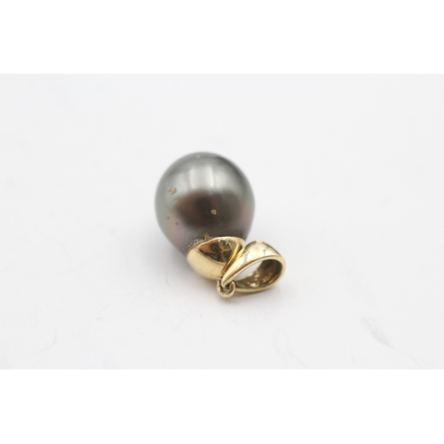 89 - 14ct gold cultured pearl pendant (2.7g)