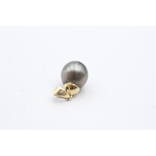 89 - 14ct gold cultured pearl pendant (2.7g)