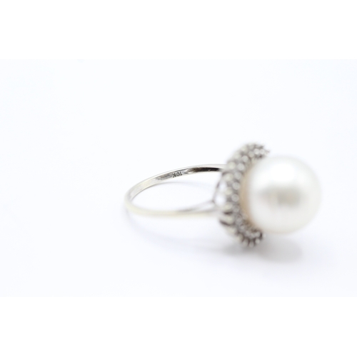 9 - 9ct white gold cultured pearl and white gemstone halo ring (5.6g) Size P 1/2