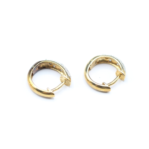 90 - 9ct gold and diamond hinged hoop earrings (2.9g)