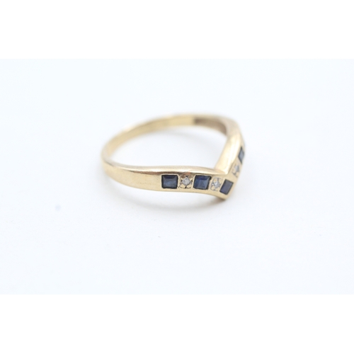 97 - 9ct gold blue gemstone and diamond chevron ring (1.6g) Size L