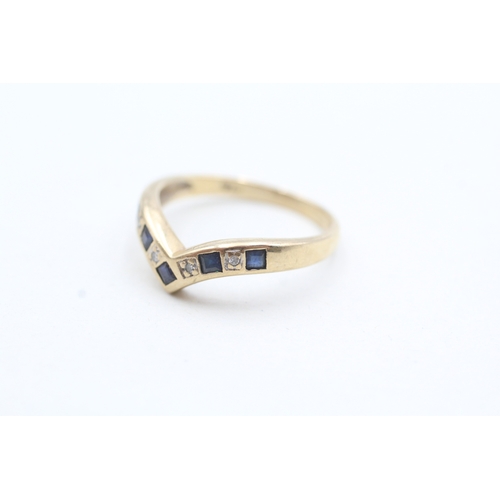 97 - 9ct gold blue gemstone and diamond chevron ring (1.6g) Size L