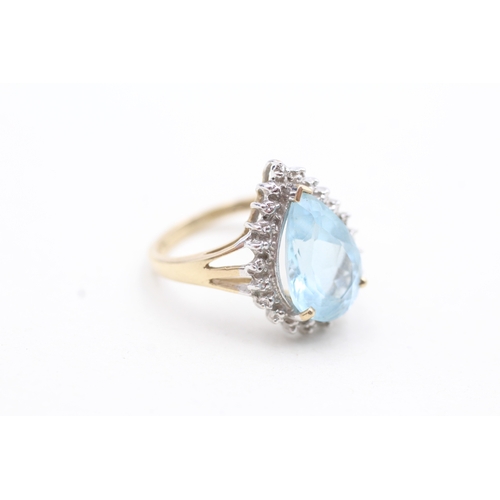 98 - 9ct gold blue gemstone and diamond pear halo ring (3.7g) Size M