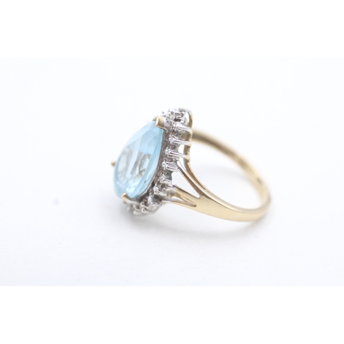 98 - 9ct gold blue gemstone and diamond pear halo ring (3.7g) Size M