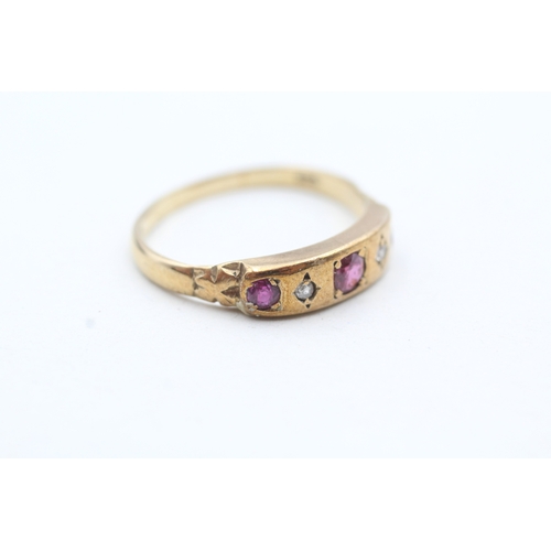 99 - 9ct gold flush set pink gemstone and diamond ring (2.7g) Size R 1/2