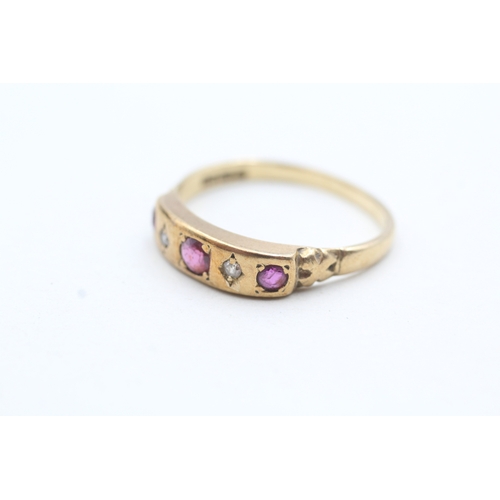 99 - 9ct gold flush set pink gemstone and diamond ring (2.7g) Size R 1/2