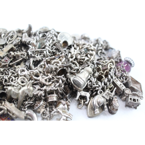 252 - Assortment of Sterling Silver Charm Bracelets inc. Souvenir, Transport 518g