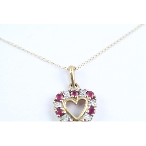 13 - 9ct gold ruby and diamond heart shaped pendant on chain