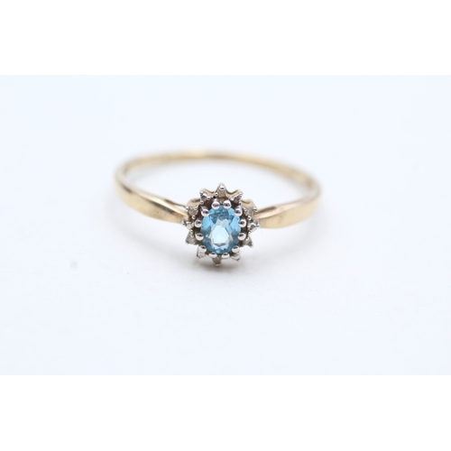 184 - 9ct gold blue topaz & diamond cluster ring (0.8g) Size V
