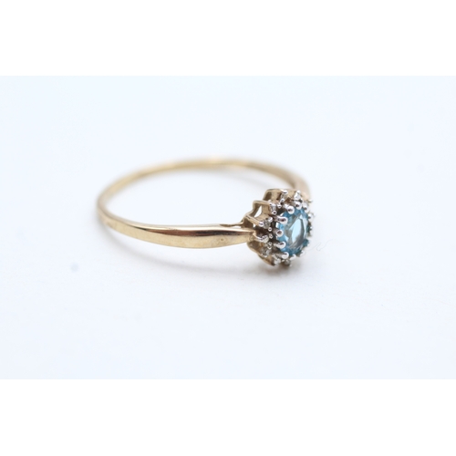 184 - 9ct gold blue topaz & diamond cluster ring (0.8g) Size V