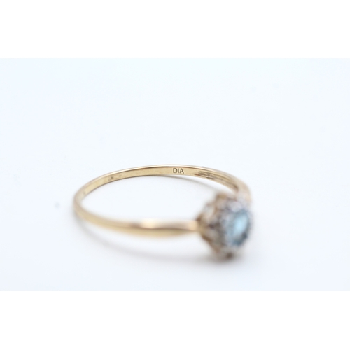 184 - 9ct gold blue topaz & diamond cluster ring (0.8g) Size V