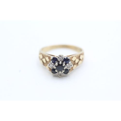 217 - 9ct gold sapphire and diamond halo ring (3.7g) Size P