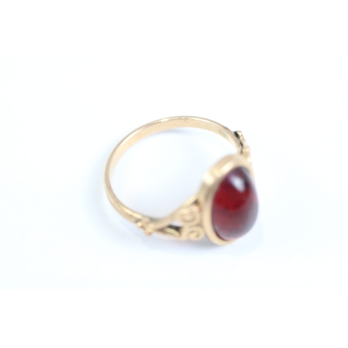 22 - 9ct gold cabochon cut red gemstone dress ring (1.8g) Size K 1/2