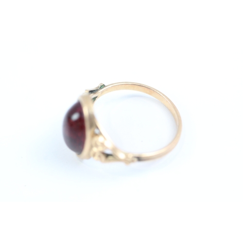 22 - 9ct gold cabochon cut red gemstone dress ring (1.8g) Size K 1/2