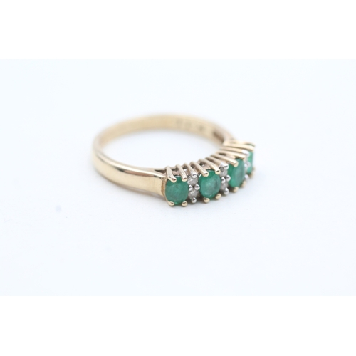 220 - 9ct gold diamond and emerald row ring (2.7g) Size N 1/2